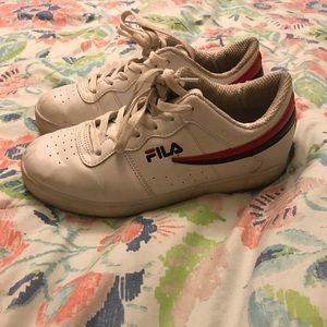 Beat up bulky fila sneakers